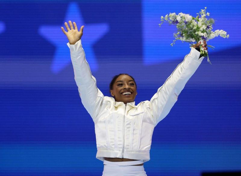 MINNEAPOLIS, MINNESOTA - JUNE 30: Simone Biles celebrates as she is announced as a member of the Olympic Team on Day Four of the 2024 U.S. Olympic Team Gymnastics Trials at Target Center on June 30, 2024 in Minneapolis, Minnesota. (Photo by Elsa/Getty Images)