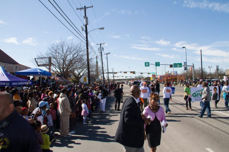 Crowd of people celebrating Black History Month in Dallas.