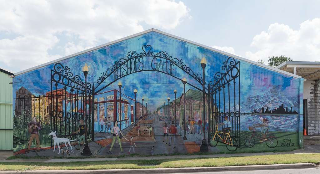 A mural painted on the side of a building in Dallas.