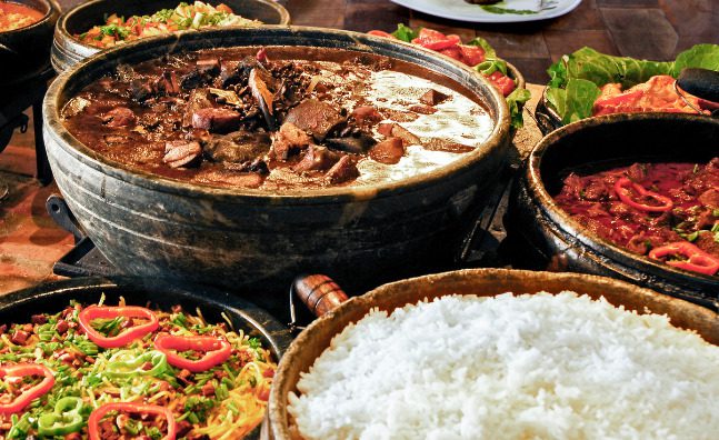 A spread of traditional Brazilian food like the kind you can find at one of our local Hispanic markets